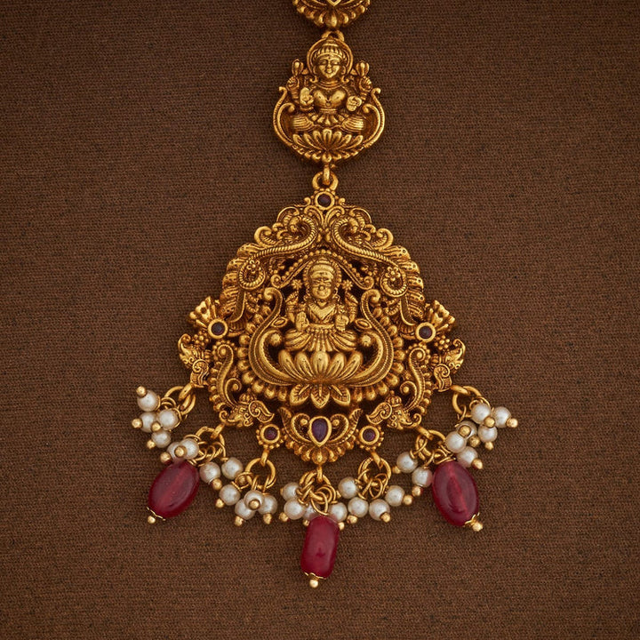 Devi Lakshmi and Elephant Motif Antique Tikka with Ruby Dangling Beads and Pearls