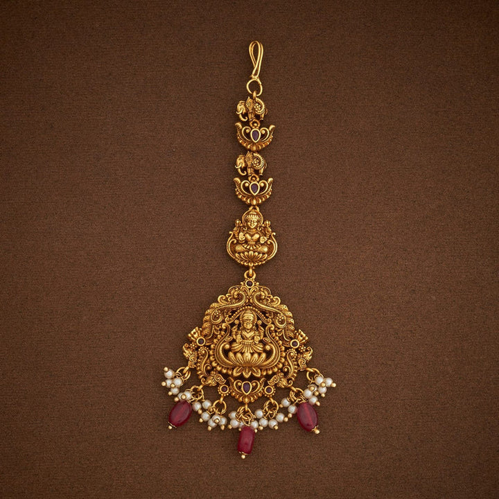 Devi Lakshmi and Elephant Motif Antique Tikka with Ruby Dangling Beads and Pearls