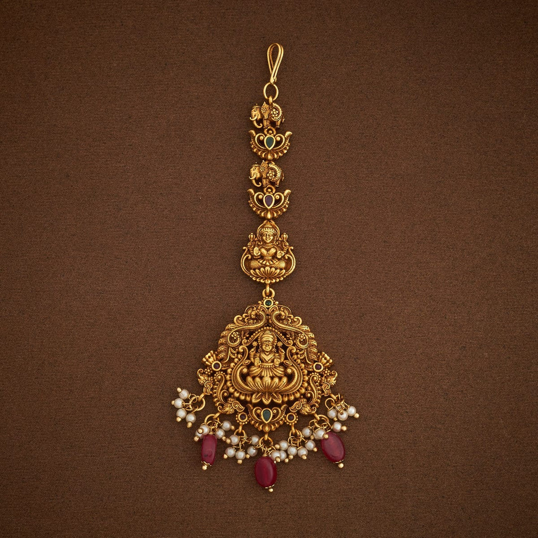 Devi Lakshmi and Elephant Motif Antique Tikka with Ruby Dangling Beads and Pearls
