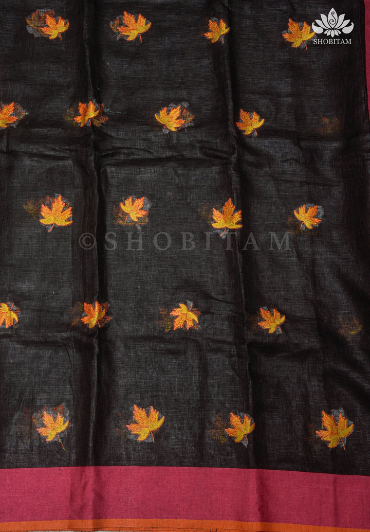 Linen by Linen Saree in Black with Fall Leaves Embroidery and Ganga Jamuna Borders | Shobitam Saree