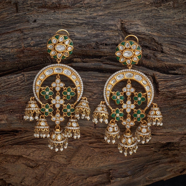 Gold-Plated Victorian-Inspired Kundan Jhumkas Earrings with Green Accents and Floral Design