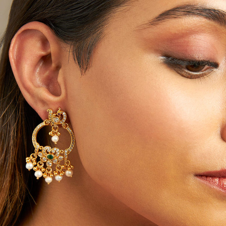 Pure 92.5 Silver Gold-Plated White Stones Peacock Motif Earrings with Green and Dangling Pearls