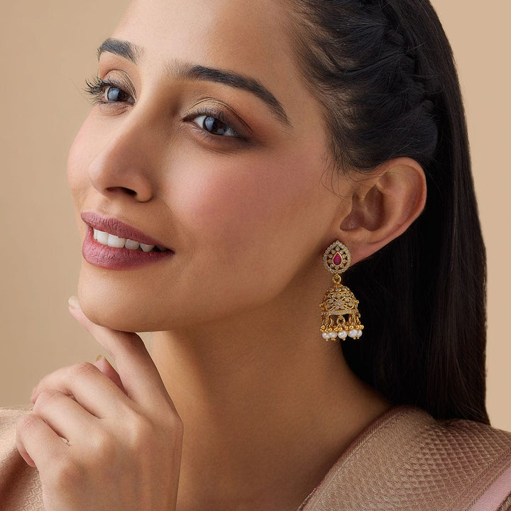 Pure 92.5 Silver Traditional Jhumkas with Emerald Center, White Stones, and Dangling Beads