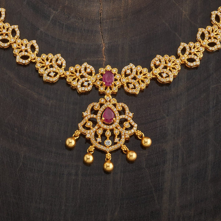 Pure 92.5 Silver Gold-Plated Floral Design Necklace with White Stones and Dangling Gold Beads