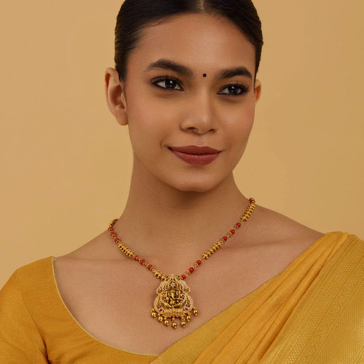 Pure 92.5 Lord Ganesha Design Temple Pendant with CZ And Green Stones And Dangling Beads