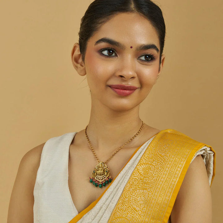 Pure 92.5 Detailed Lakshmi Peacock Pendant in Gold Finish with Gemstone Embellishments