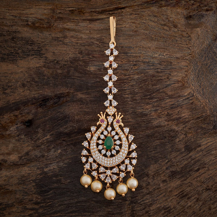 Flower Motif Handcrafted gold-polished Tikka embellished with synthetic stones and beads in Green