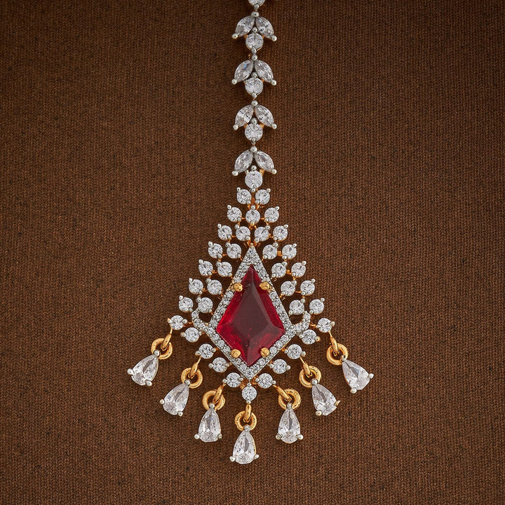 Handcrafted Tikka embellished with synthetic stones in White and Ruby
