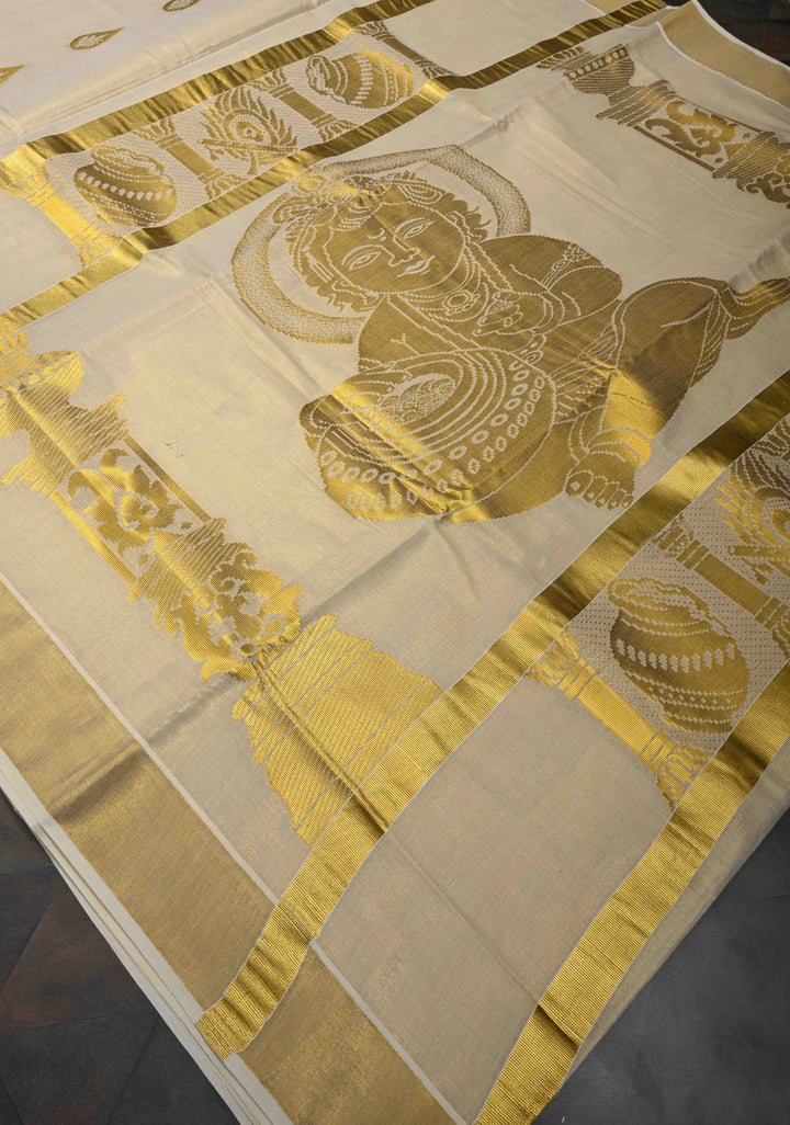 Unique Kerala Kasavu Saree in Tissue Cotton with Zari Buttas and Baby Krishna Theme on Pallu