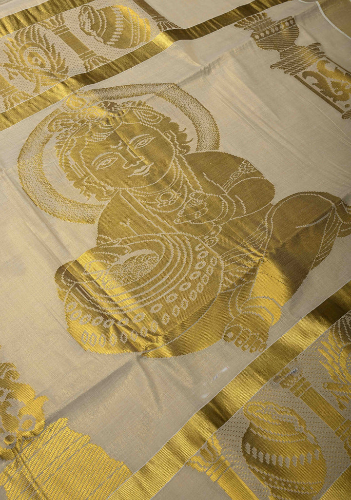 Unique Kerala Kasavu Saree in Tissue Cotton with Zari Buttas and Baby Krishna Theme on Pallu