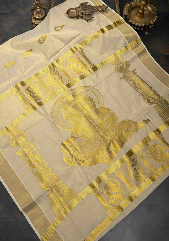 Unique Kerala Kasavu Saree in Tissue Cotton with Zari Buttas and Baby Krishna Theme on Pallu