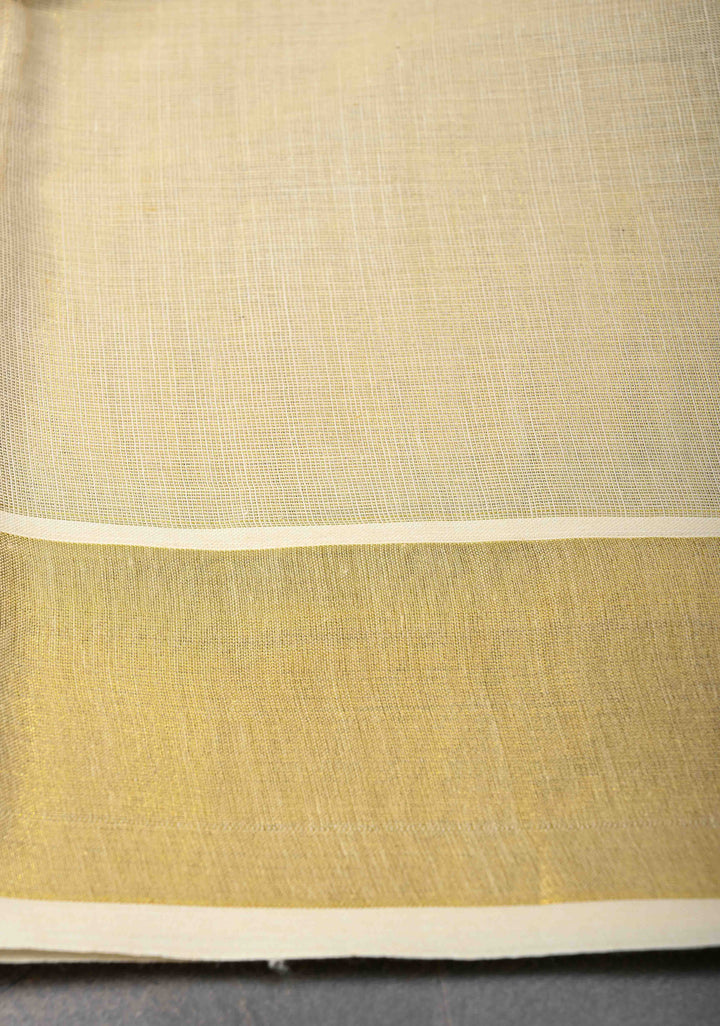 Unique Kerala Kasavu Saree in Tissue Cotton with Zari Buttas and Baby Krishna Theme on Pallu