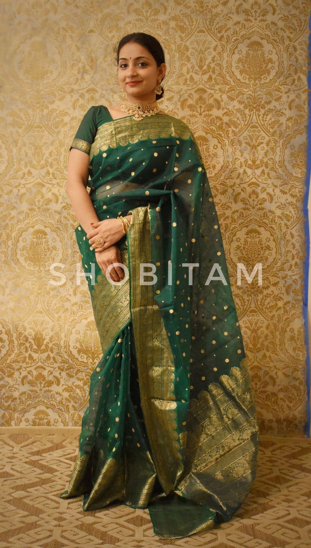 Authentic Emerald Green Chanderi Silk Saree with dense dainty buttas and Wide Zari Buttas. Celebrity Saree