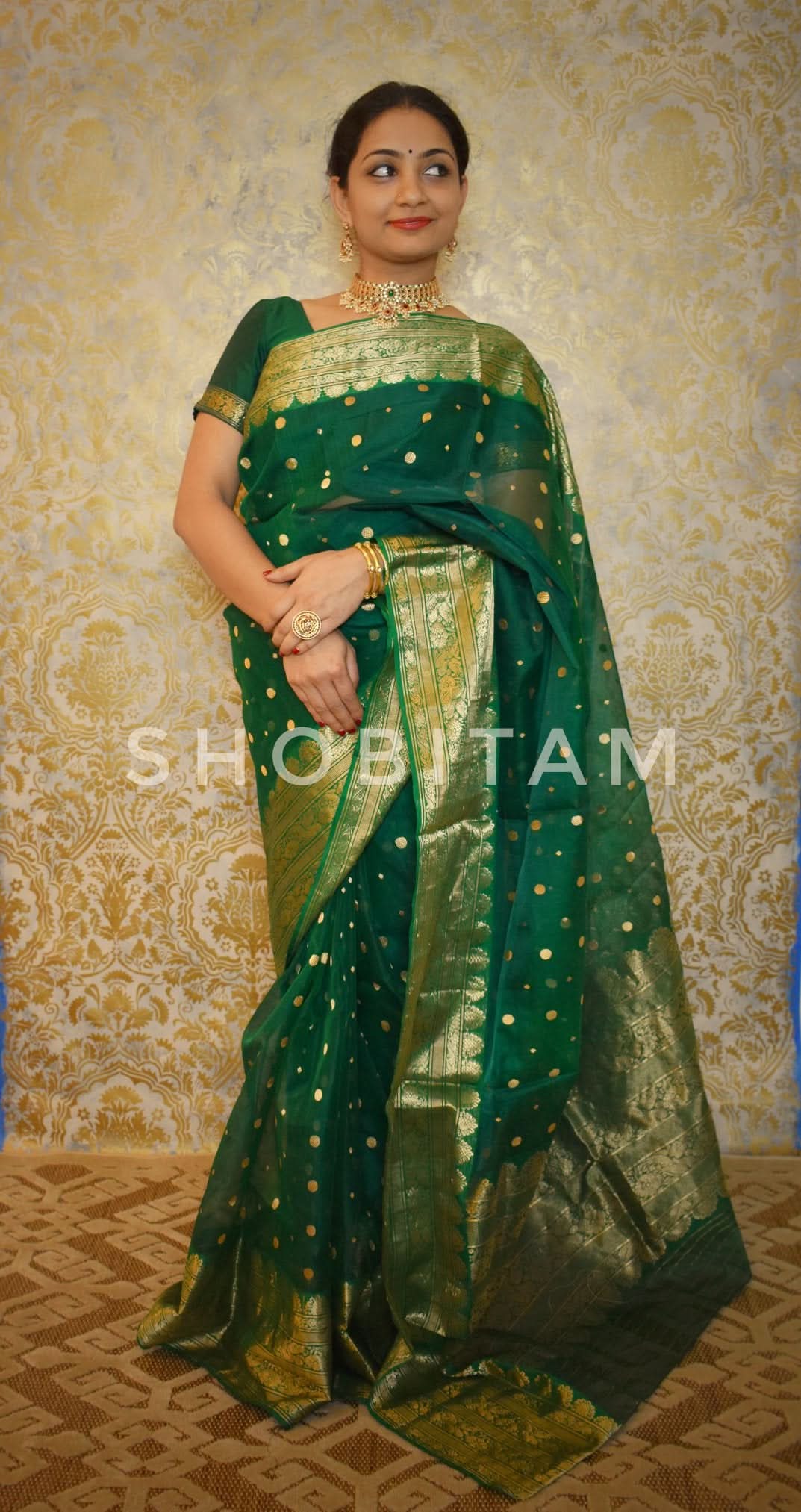 Authentic Emerald Green Chanderi Silk Saree with dense dainty buttas and Wide Zari Buttas. Celebrity Saree