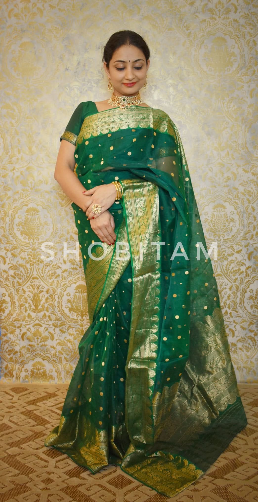 Authentic Emerald Green Chanderi Silk Saree with dense dainty buttas and Wide Zari Buttas. Celebrity Saree