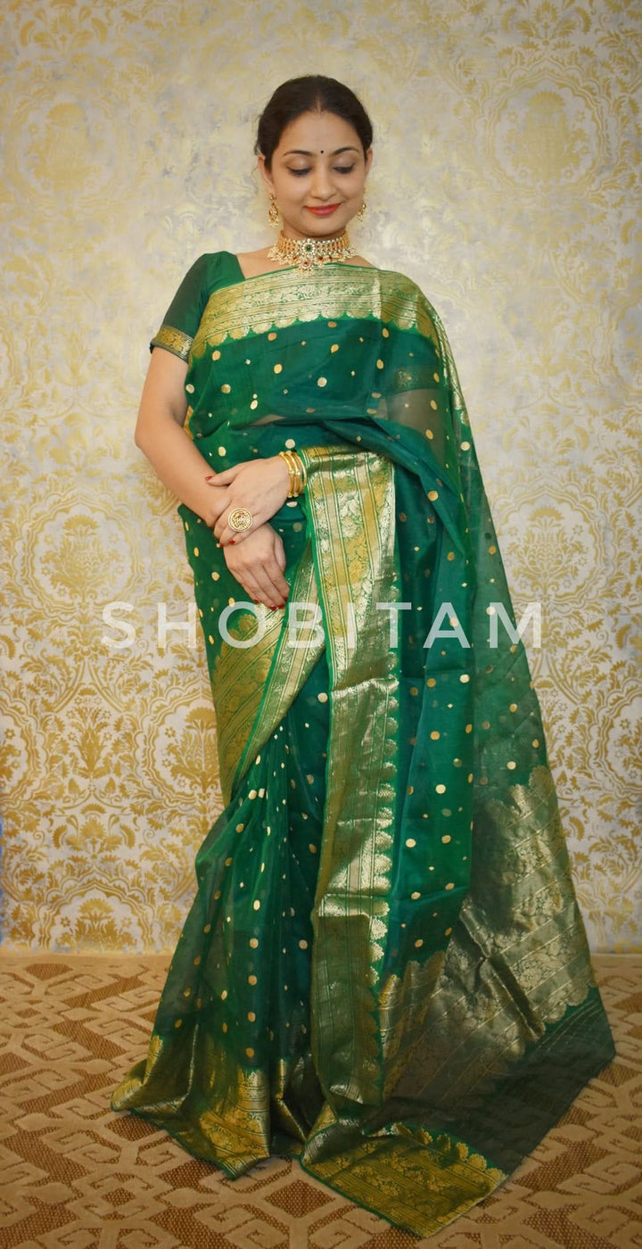 Authentic Emerald Green Chanderi Silk Saree with dense dainty buttas and Wide Zari Buttas. Celebrity Saree