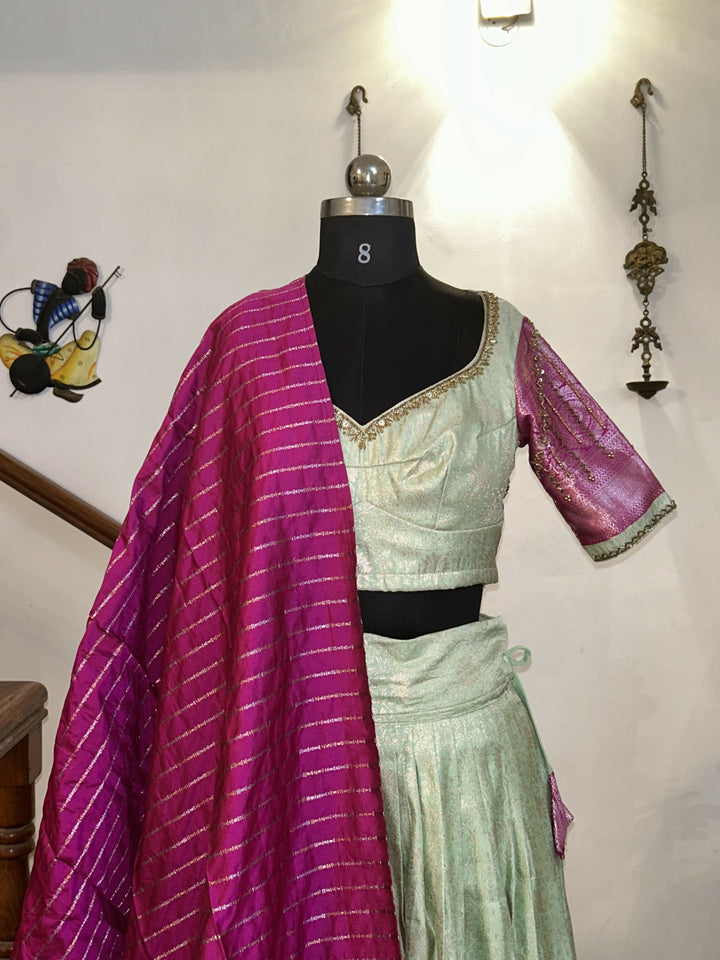 Yuvathi Mint green silk half Saree lehenga set with aari work