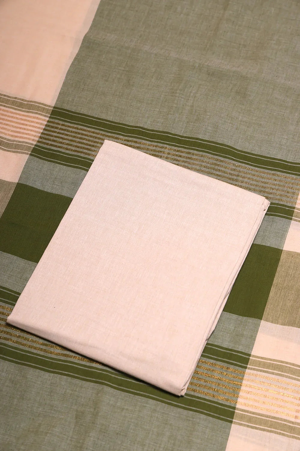 Beige and Green Woven Suit Set with Subtle Buti & Zari Dupatta | SHOBITAM