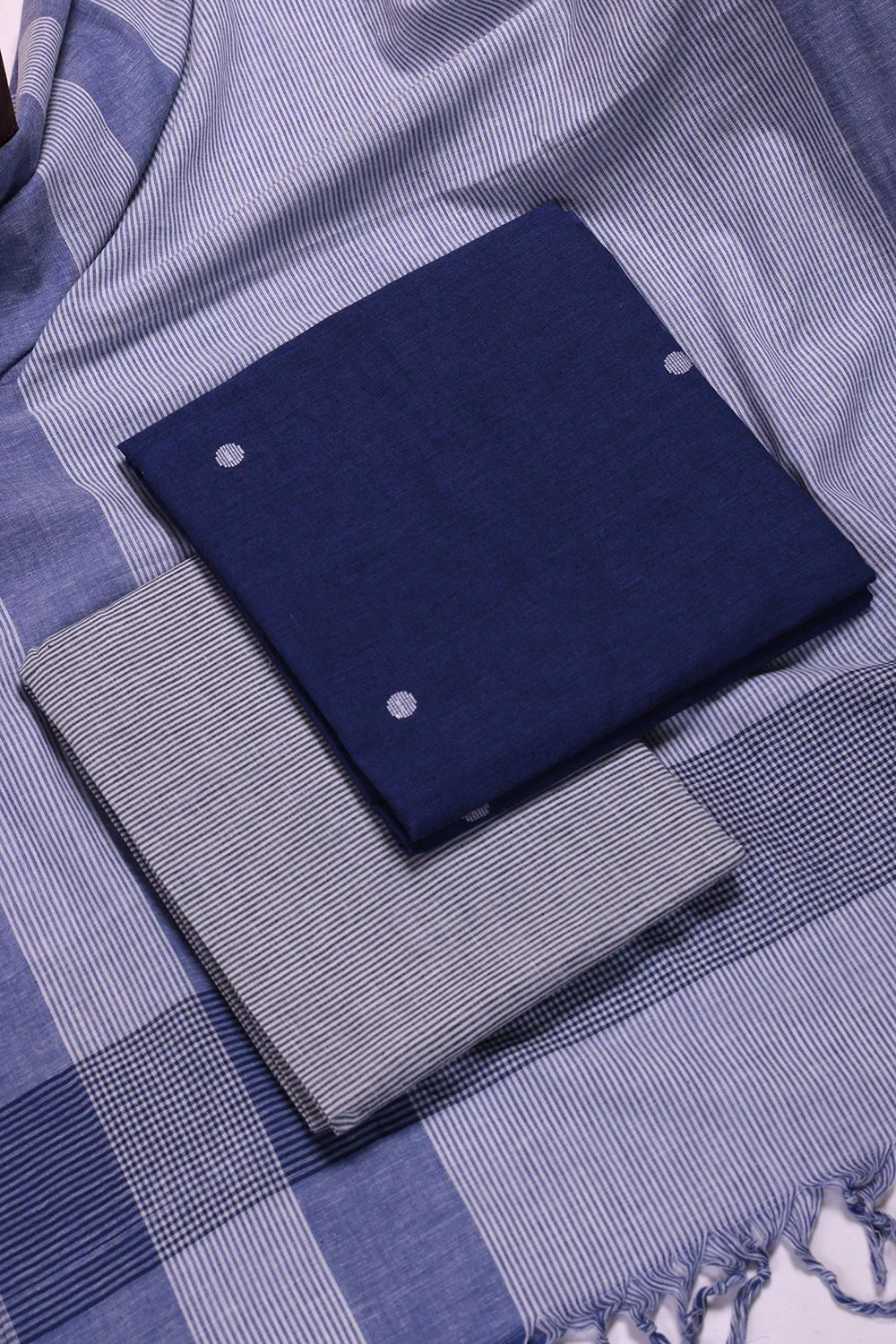 Navy Blue and White Woven Suit Set with Subtle Buti & Stripes Dupatta | SHOBITAM