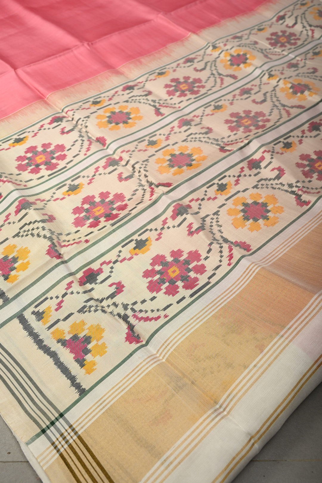 Peach Authentic Patan Patola Single Ikkat Pure Silk Saree with Floral Design on Contrast Off White Minimal Zari Border Pallu | SILK MARK CERTIFIED | SHOBITAM