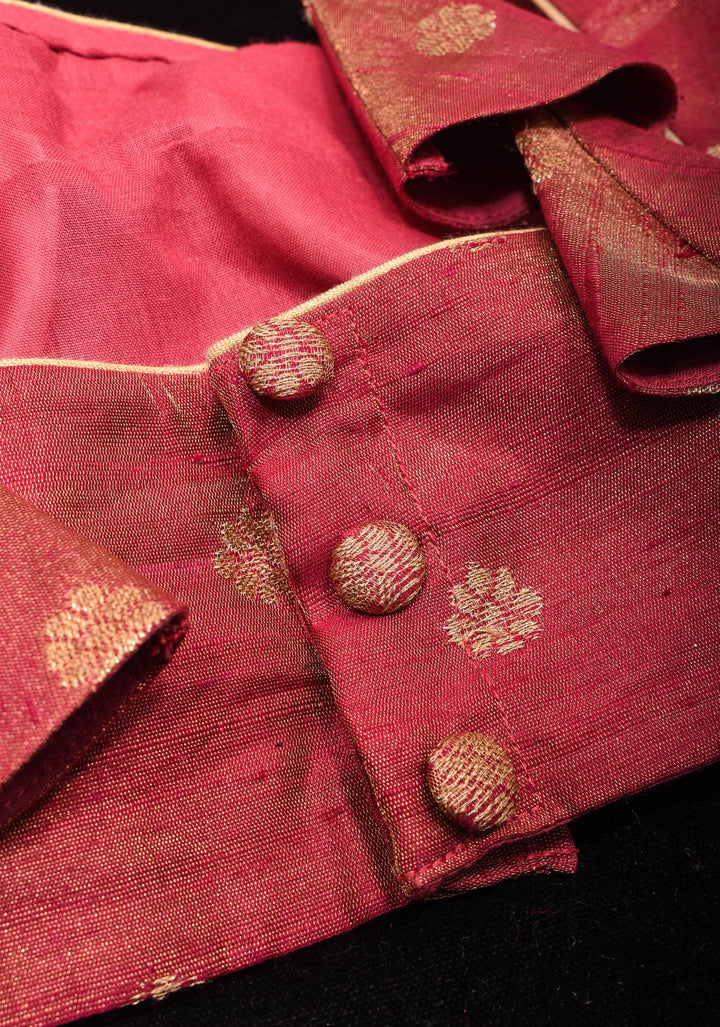 Deep Square Neck Sleeveless blouse in Reddish pink Pure Tissue Raw silk with zari buttas