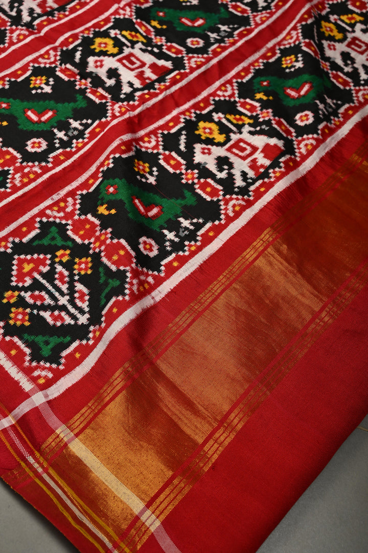 Ivory Jugalbandi Authentic Patan Patola Double Ikkat Pure Silk Saree With Parsi Gara Hand Embroidery Floral Jaal and Contrst Black Pallu on Both Side | SILK MARK CERTIFIED | SHOBITAM