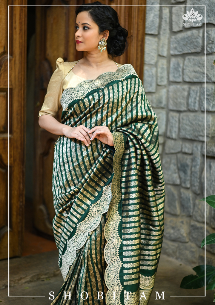 Bottle Green Banarasi Katan Silk Saree with Vertical Zari Stripes and Scalloped Border | SILK MARK CERTIFIED | SHOBITAM