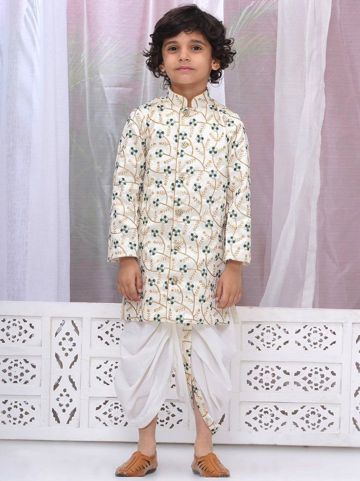 Boys Silk Brocade Full Sleeves Sherwani and Dhoti with Floral Embroidery & Kundan Buttons- Cream | SHOBITAM