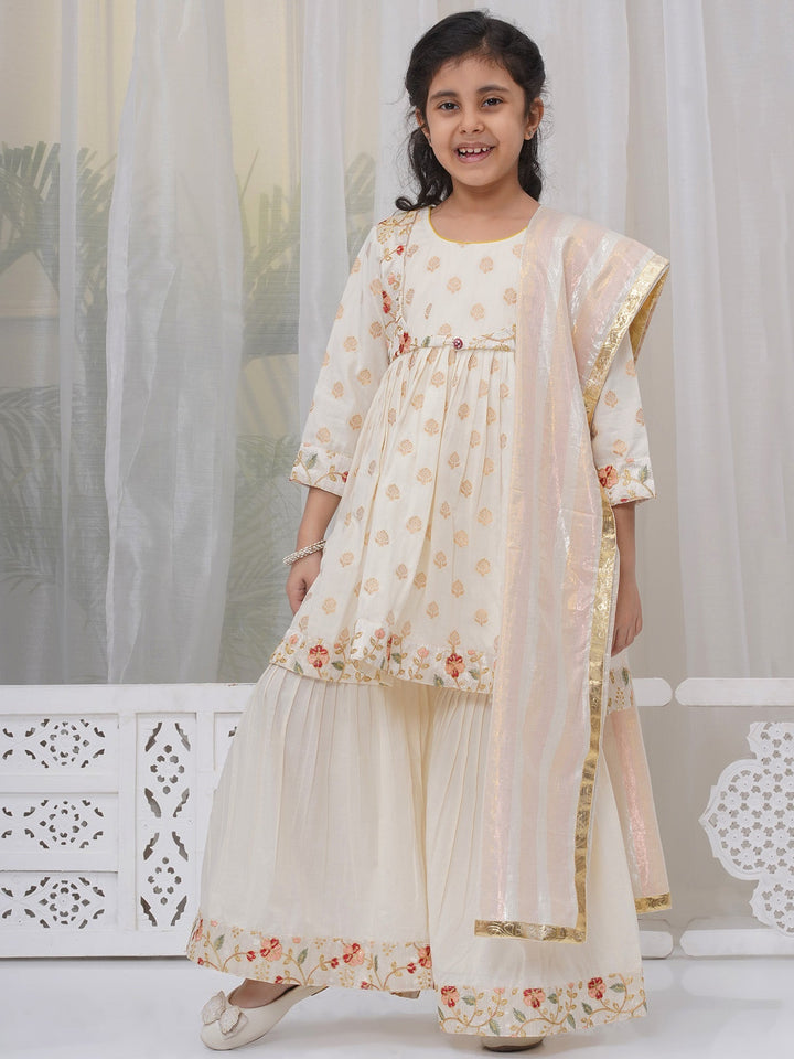 Girls Cotton Three Fourth Sleeves Frock Kurta with Sharara and Dupatta with Floral Embroidery & Zari Work - Cream | SHOBITAM