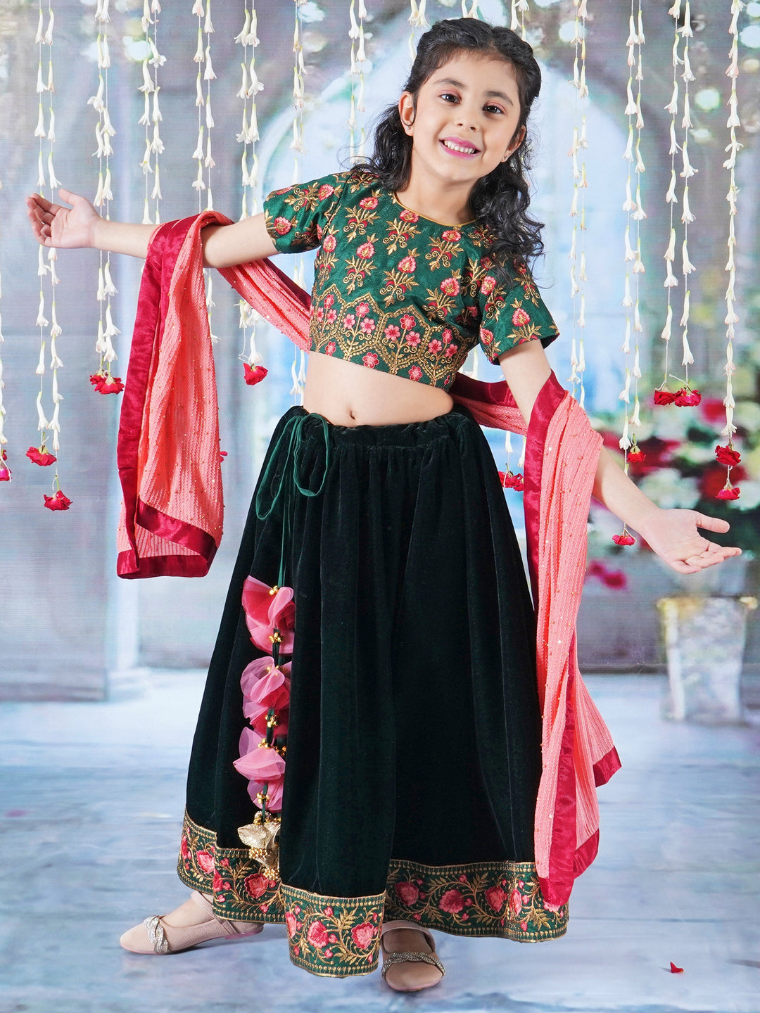 Girl Bageecha Floral Thread work Blouse with Velvet Lehenga and Sequin moti work Dupatta, accompanied with Hand made tassel and Ghungroo work in Green | SHOBITAM
