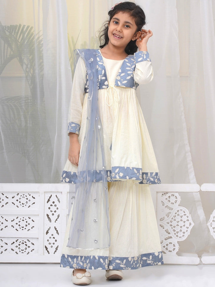 Girls Cotton Three Fourth Sleeves Frock Style Kurta with Sharara and Dupatta with Floral Thread Embroidery & Tussel Work - Cream | SHOBITAM