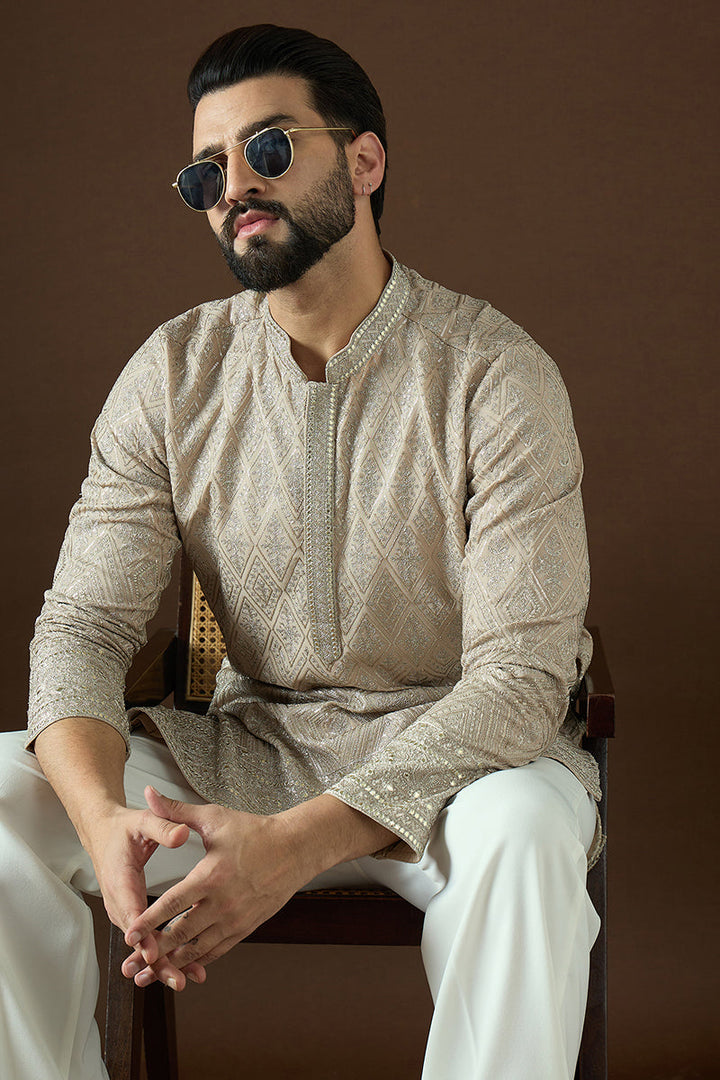 Beige Gerogrtte Solid Embroidered Straight Kurta | SHOBITAM