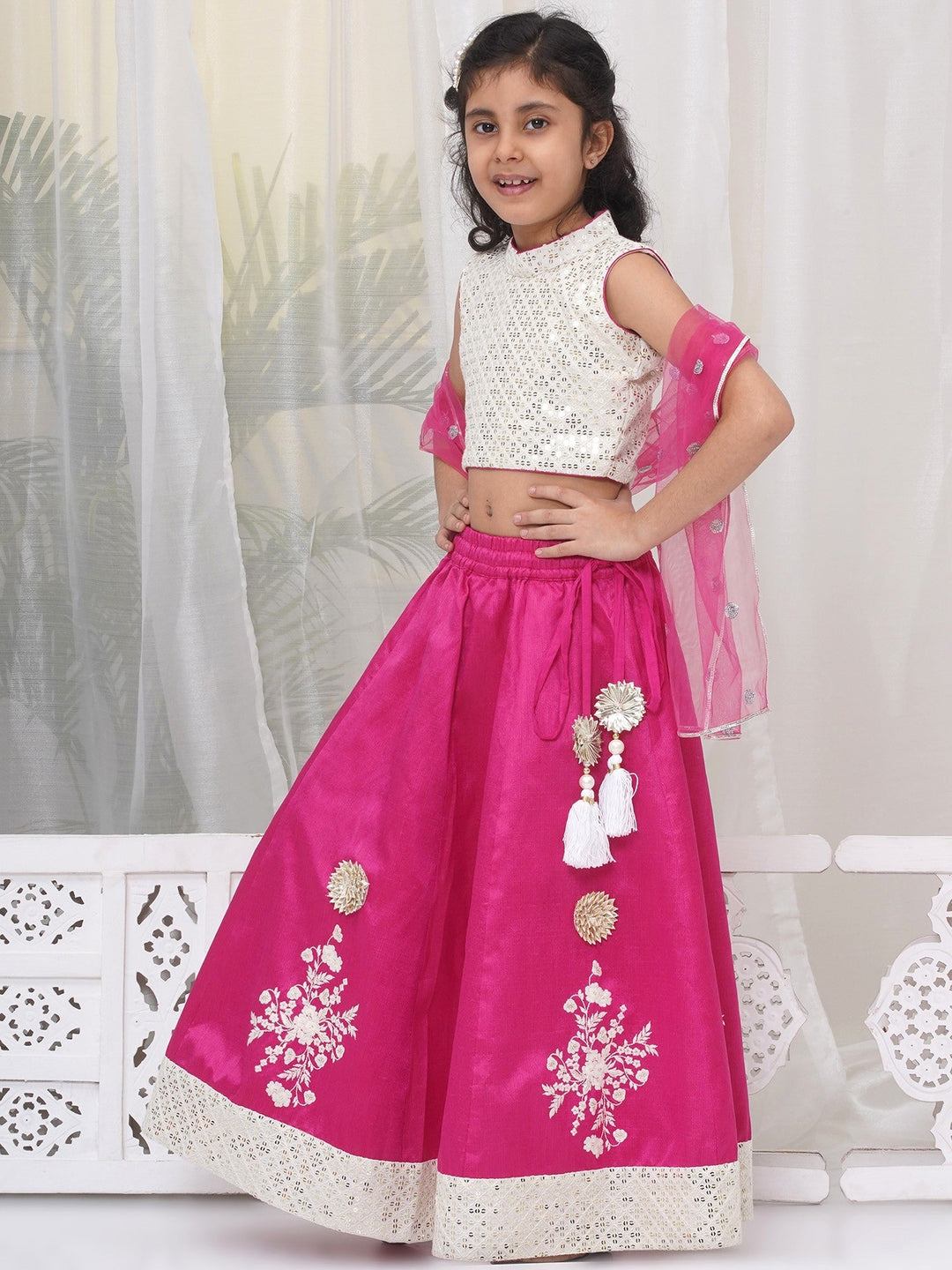 Girls Semi-Silk Brocade Kali Work Lehenga with Floral Thread Work & Sequin work Sleeveless Blouse with Dupatta - Hot Pink | SHOBITAM