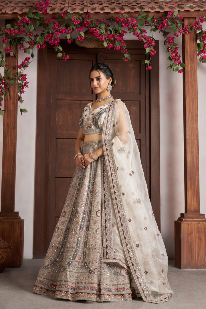 Premium White Bridal Lehenga with Intricate Floral Artistry | SHOBITAM