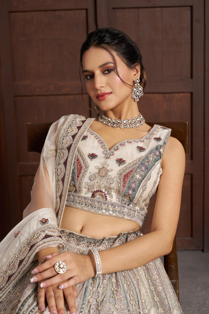 Premium White Bridal Lehenga with Intricate Floral Artistry | SHOBITAM