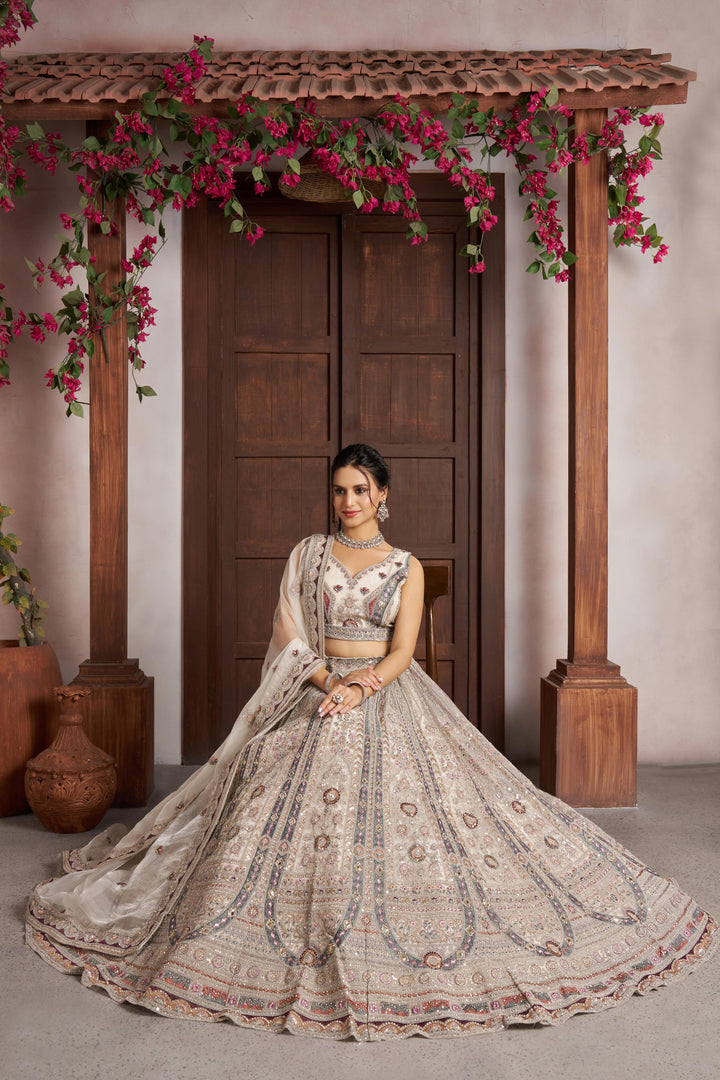 Premium White Bridal Lehenga with Intricate Floral Artistry | SHOBITAM