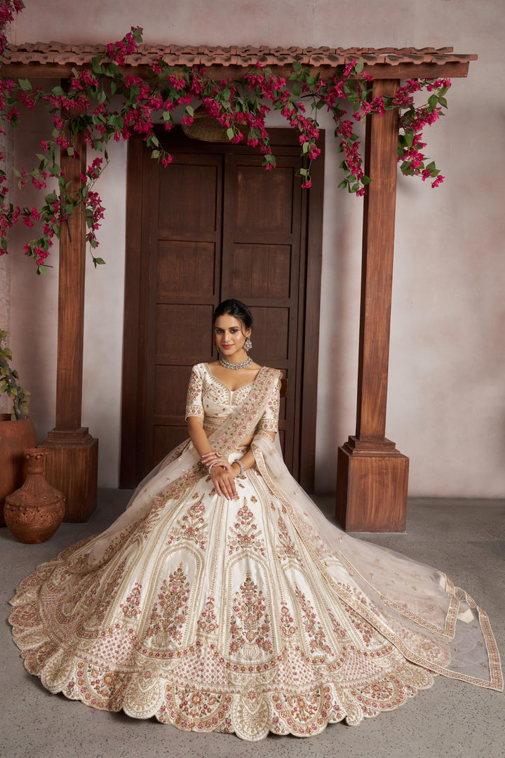 Elegant White bridal Lehenga with Double Dupatta & Multicolor Embroidery | SHOBITAM