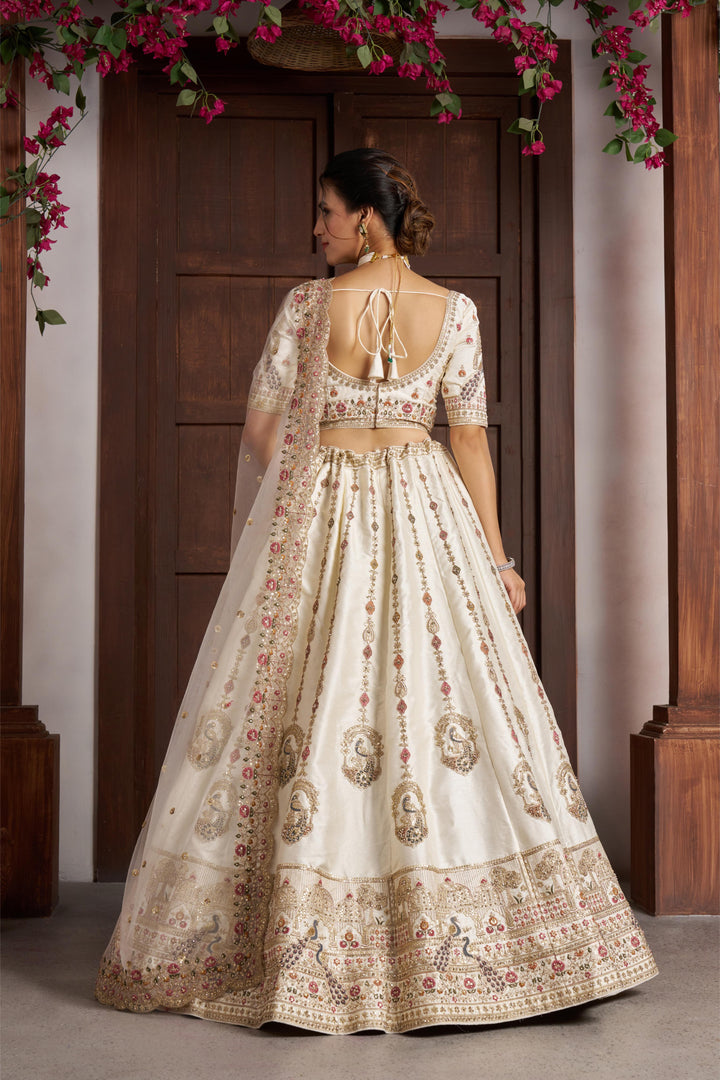 Luxurious White Lehenga with Elegant Thread & Peacock Design | SHOBITAM