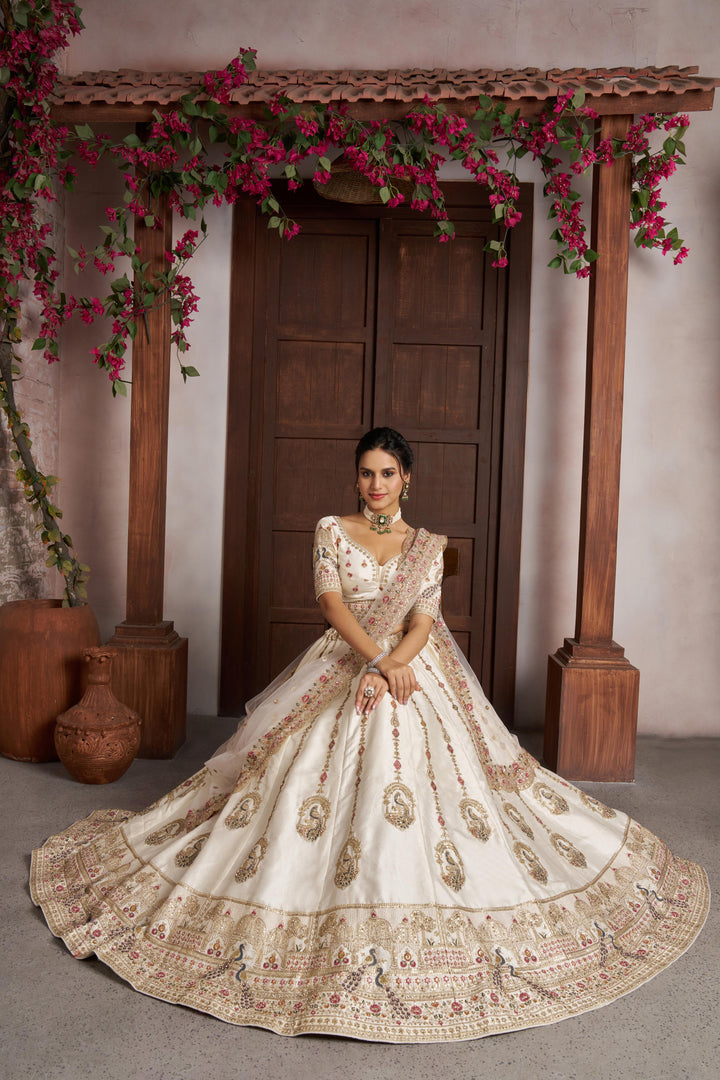 Luxurious White Lehenga with Elegant Thread & Peacock Design | SHOBITAM