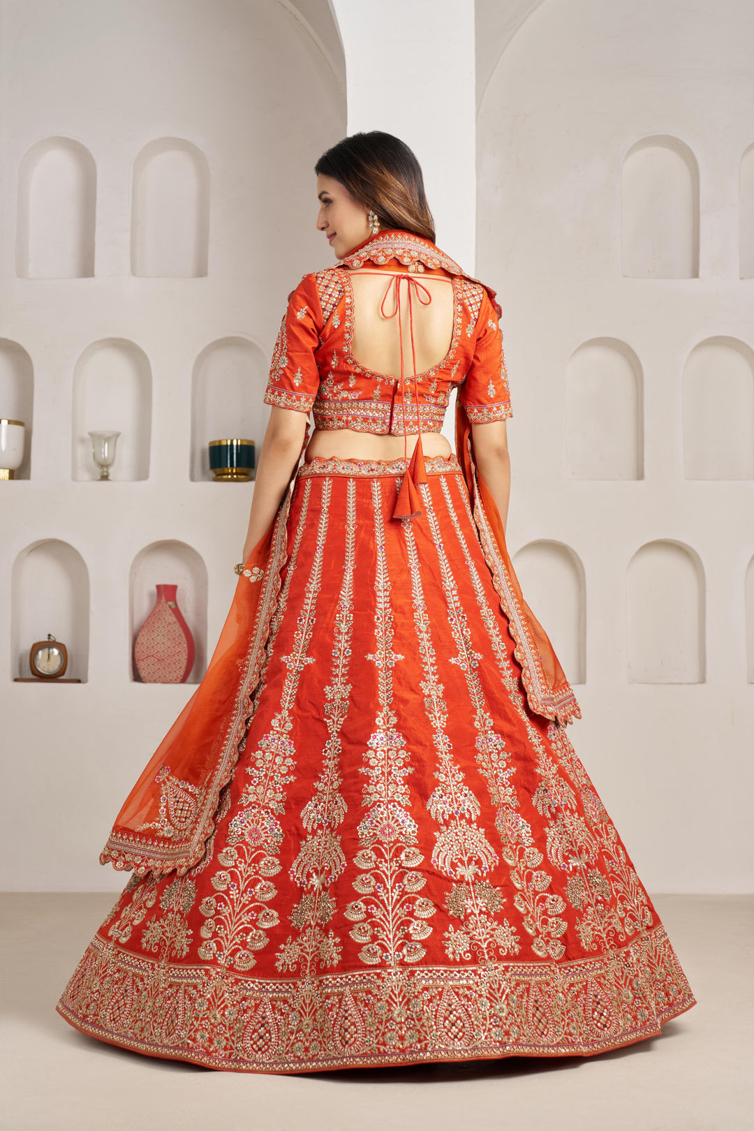 Graceful Rust Lehenga with Intricate Floral Embroidery | SHOBITAM