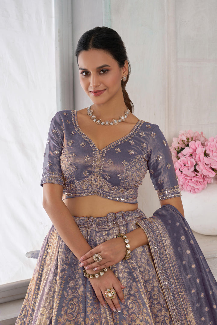 Luxurious Purple Jari Tissue Lehenga Adorned with Delicate Beadwork | SHOBITAM