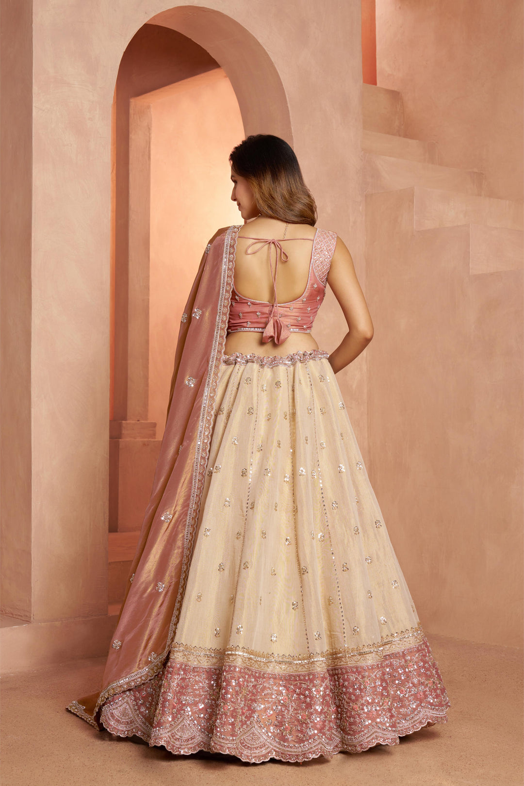 Designer Peach Lehenga with Luxurious Embellished Details | SHOBITAM