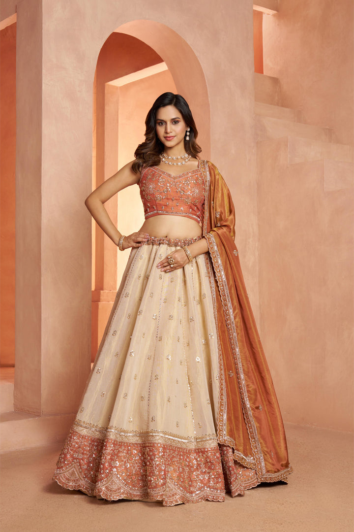 Dreamy Rust Cream Girlish Lehenga with Handcrafted Embellishments | SHOBITAM
