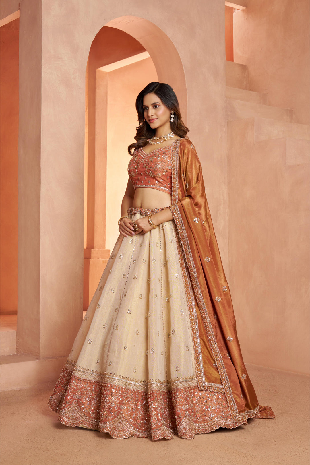 Dreamy Rust Cream Girlish Lehenga with Handcrafted Embellishments | SHOBITAM