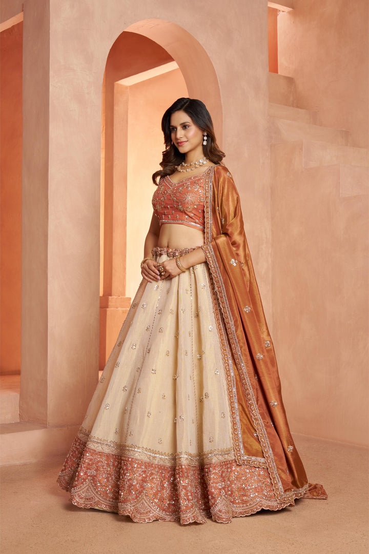 Dreamy Rust Cream Girlish Lehenga with Handcrafted Embellishments | SHOBITAM