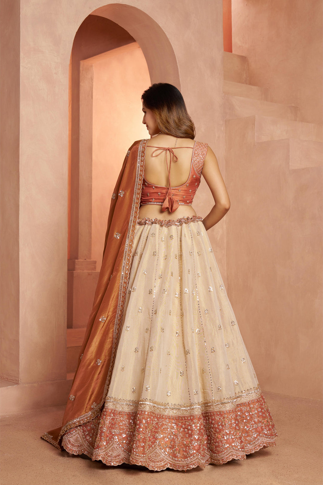 Dreamy Rust Cream Girlish Lehenga with Handcrafted Embellishments | SHOBITAM