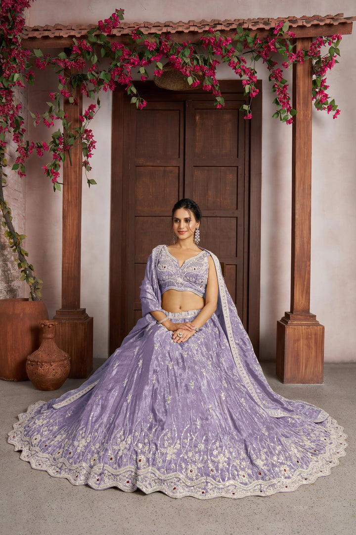 Luxurious Purple Banarasi Tissue Lehenga Adorned with Bead Embellishments | SHOBITAM