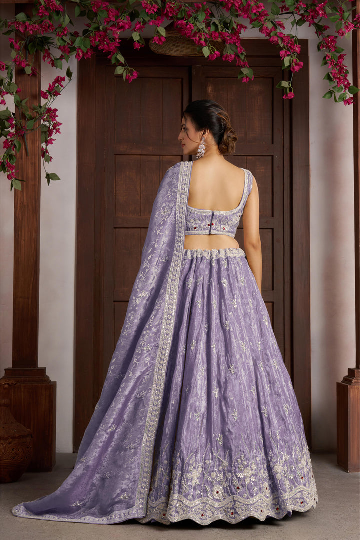 Luxurious Purple Banarasi Tissue Lehenga Adorned with Bead Embellishments | SHOBITAM