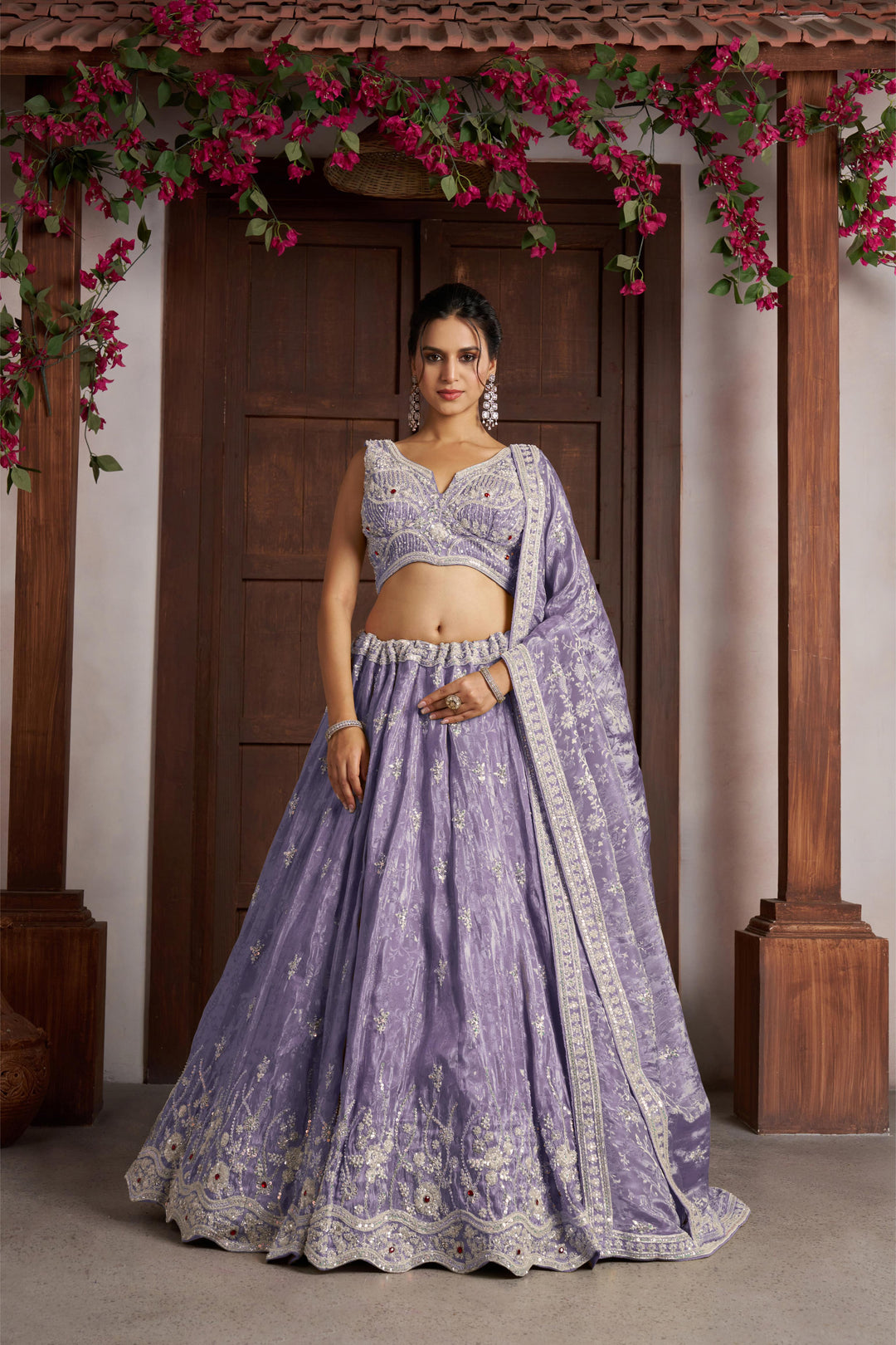 Luxurious Purple Banarasi Tissue Lehenga Adorned with Bead Embellishments | SHOBITAM