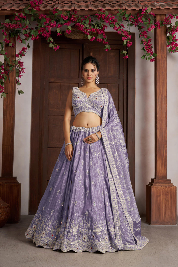 Luxurious Purple Banarasi Tissue Lehenga Adorned with Bead Embellishments | SHOBITAM